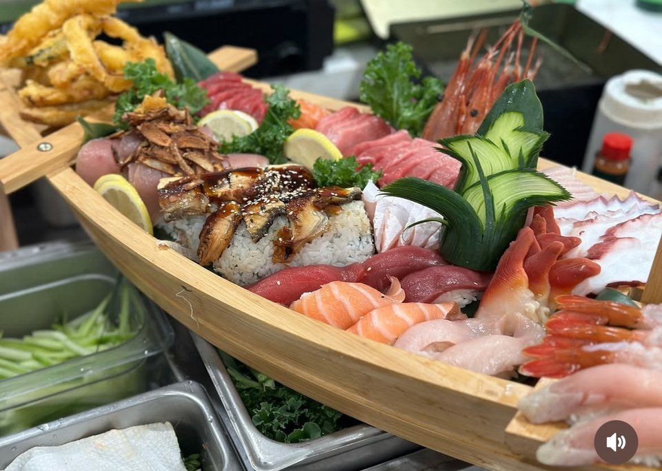 Assorted sushi platters arranged for serving.